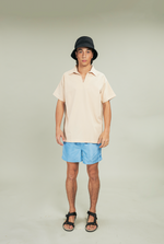 Load image into Gallery viewer, Cream V-Neck Linen Polo
